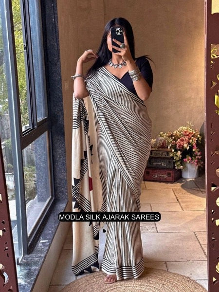 Ivory white black modal silk contemporary ajrakh saree with geometric stripe pattern artistic statement pallu tassel detailing