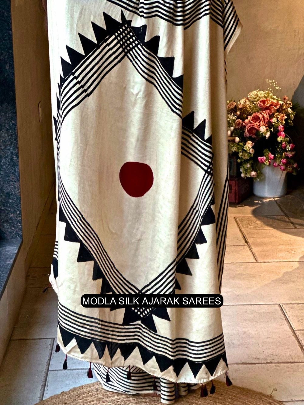 Ivory white black modal silk contemporary ajrakh saree with geometric stripe pattern artistic statement pallu tassel detailing