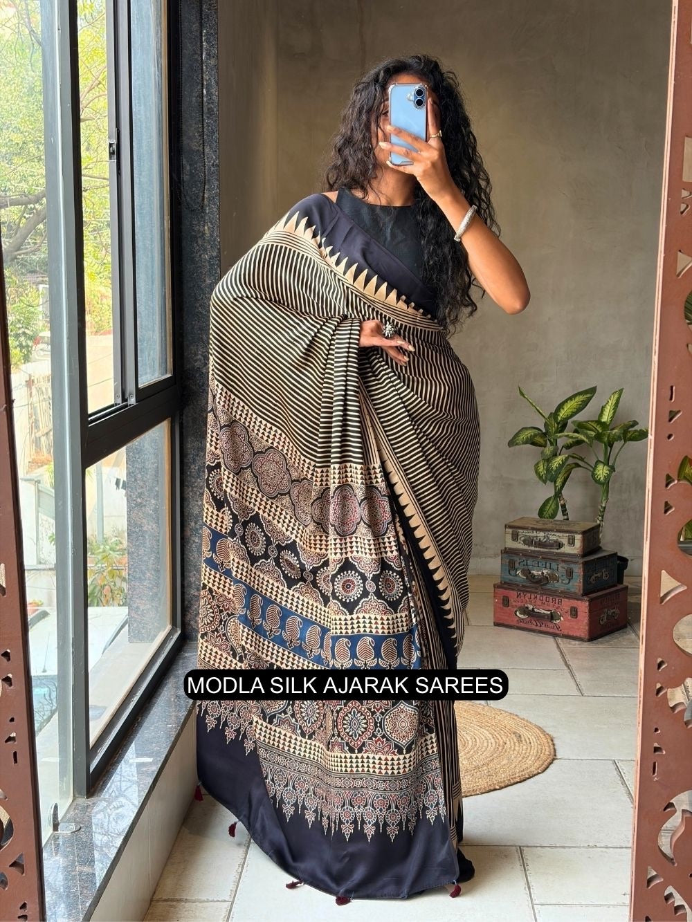 Black beige modal silk ajrakh printed saree with geometric stripes heritage pallu tassel detailing