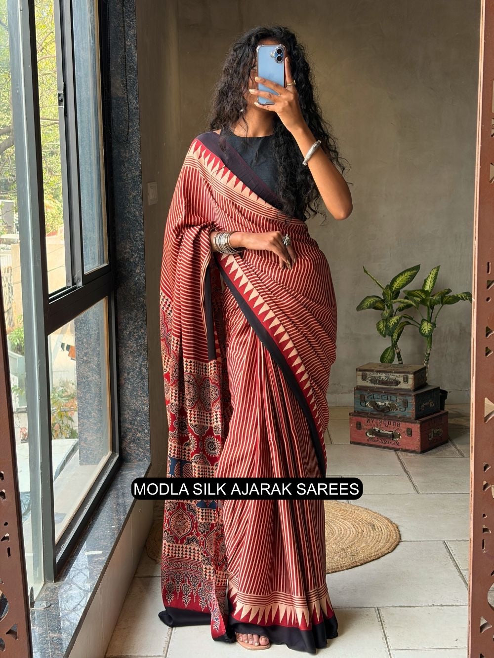 Red beige modal silk ajrakh printed saree with striped design heritage pallu tassel detailing mameraa
