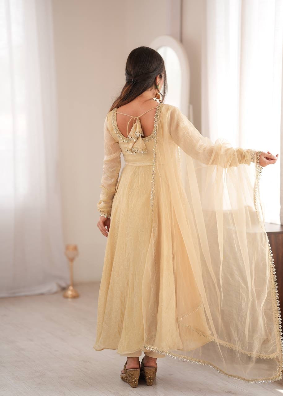 Elegant cream gold anarkali suit set with lace trimmed dupatta