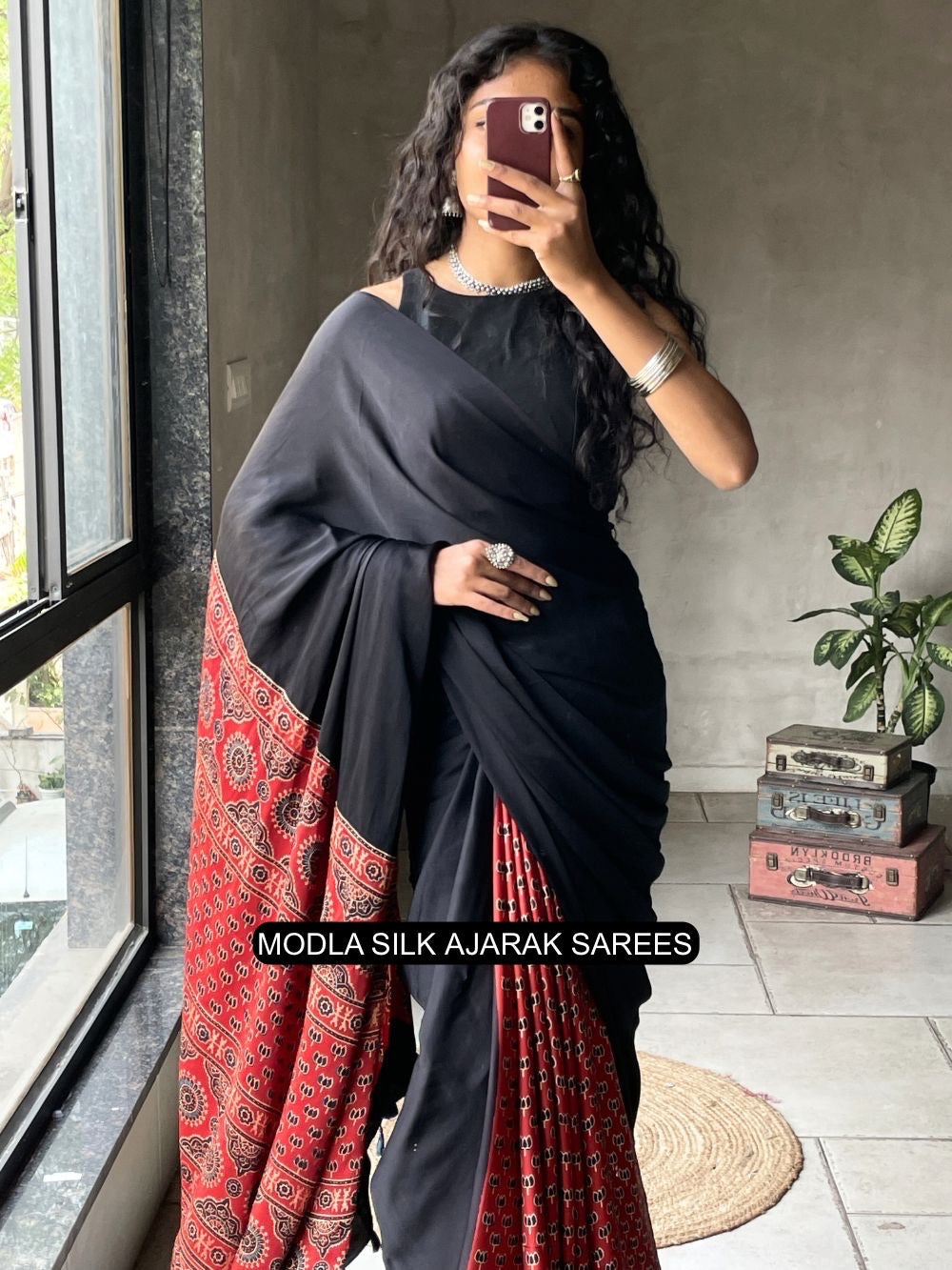 Black red modal silk ajrakh printed saree with heritage border traditional pallu tassel detailing