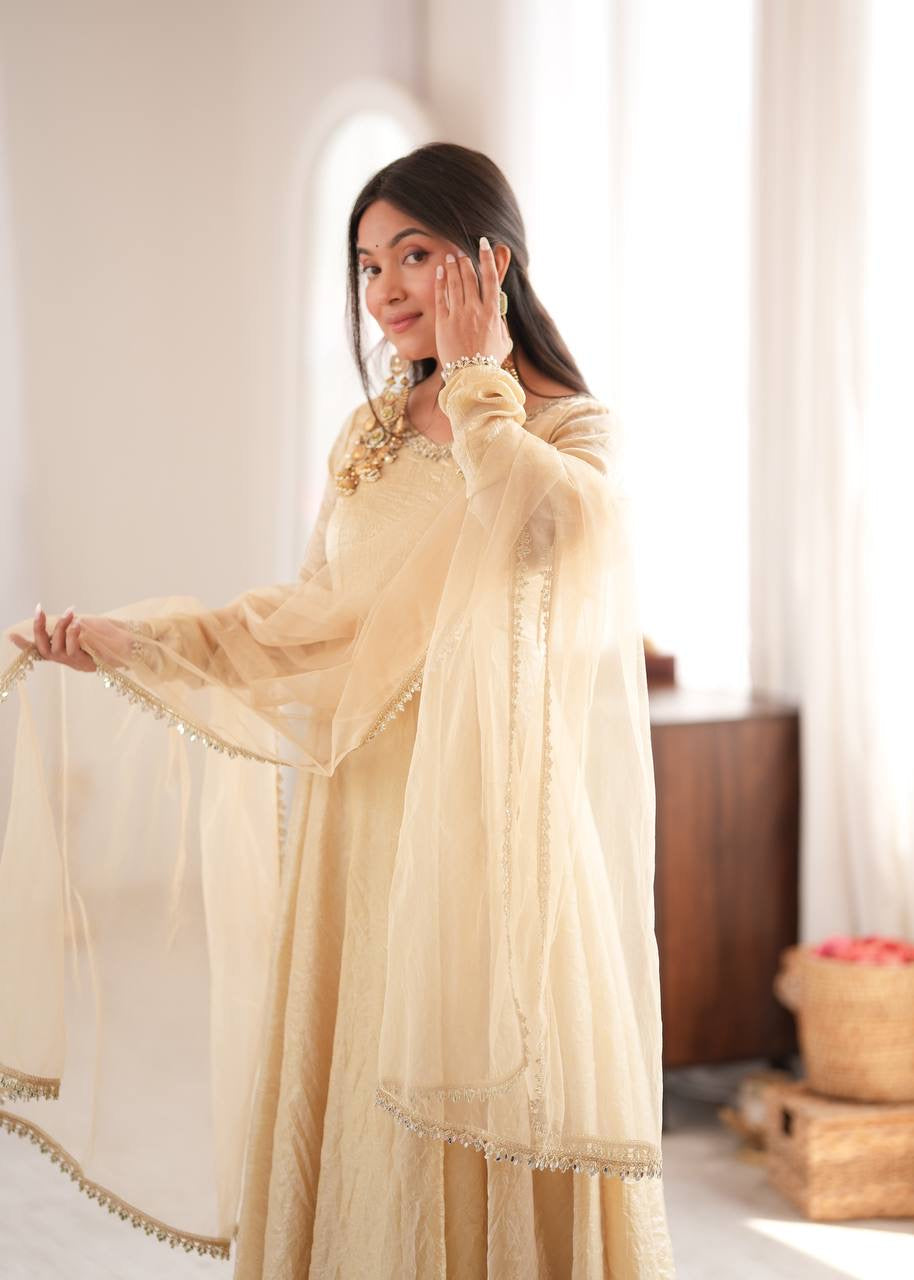 Elegant cream gold anarkali suit set with lace trimmed dupatta