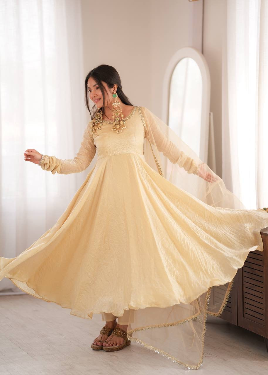Elegant cream gold anarkali suit set with lace trimmed dupatta