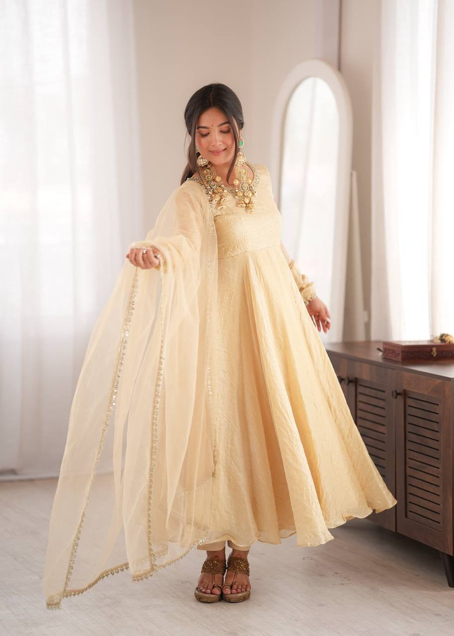 Elegant cream gold anarkali suit set with lace trimmed dupatta