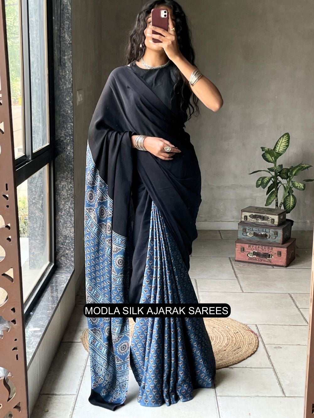 Black indigo blue modal silk ajrakh saree with heritage printed pallu traditional motifs tassel detailing mameraa