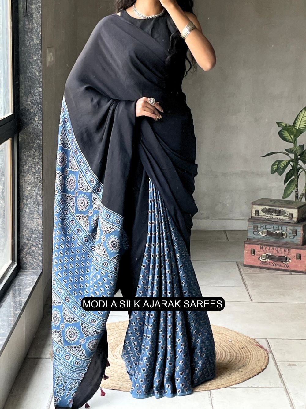 Black indigo blue modal silk ajrakh saree with heritage printed pallu traditional motifs tassel detailing