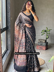 Black modal silk ajrakh printed saree with traditional buta motifs heritage artistic pallu intricate ethnic border mameraa