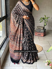Black modal silk ajrakh printed saree with traditional buta motifs heritage artistic pallu intricate ethnic border