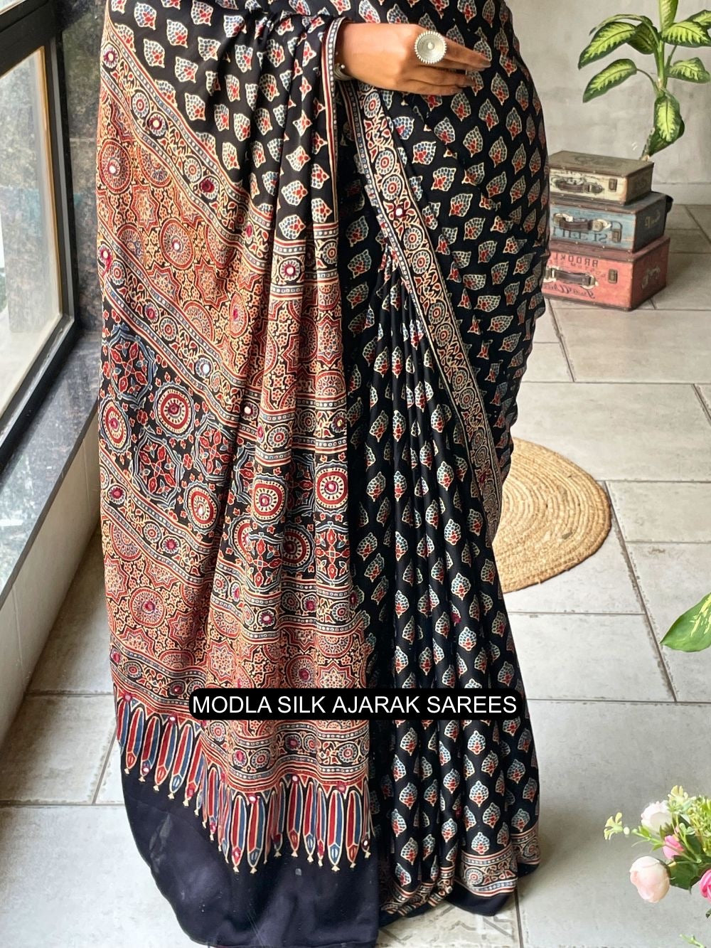 Black modal silk ajrakh printed saree with traditional buta motifs heritage artistic pallu intricate ethnic border