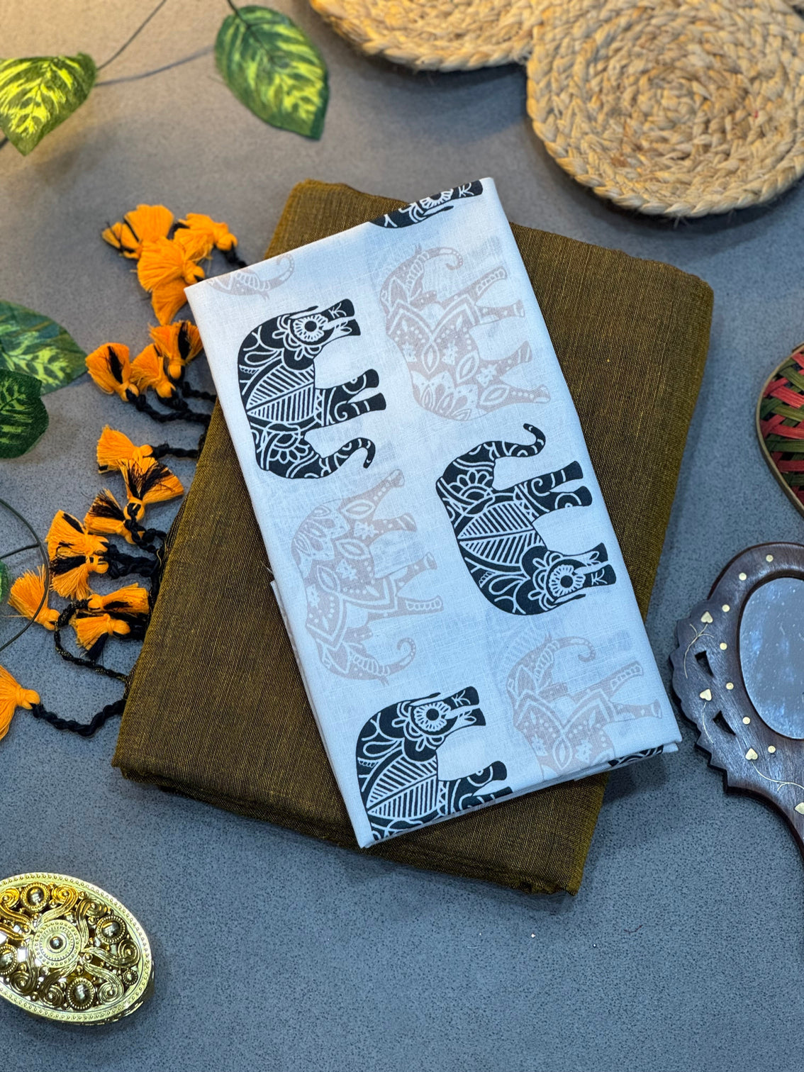 Handwoven olive green khadi cotton saree with white elephant digital print blouse mameraa