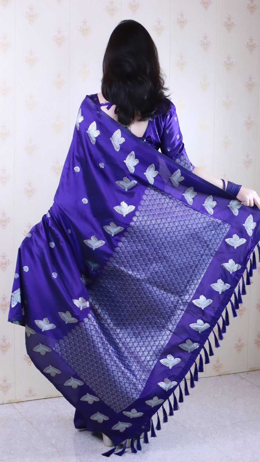 Violet soft silk dual zari woven saree with bird border