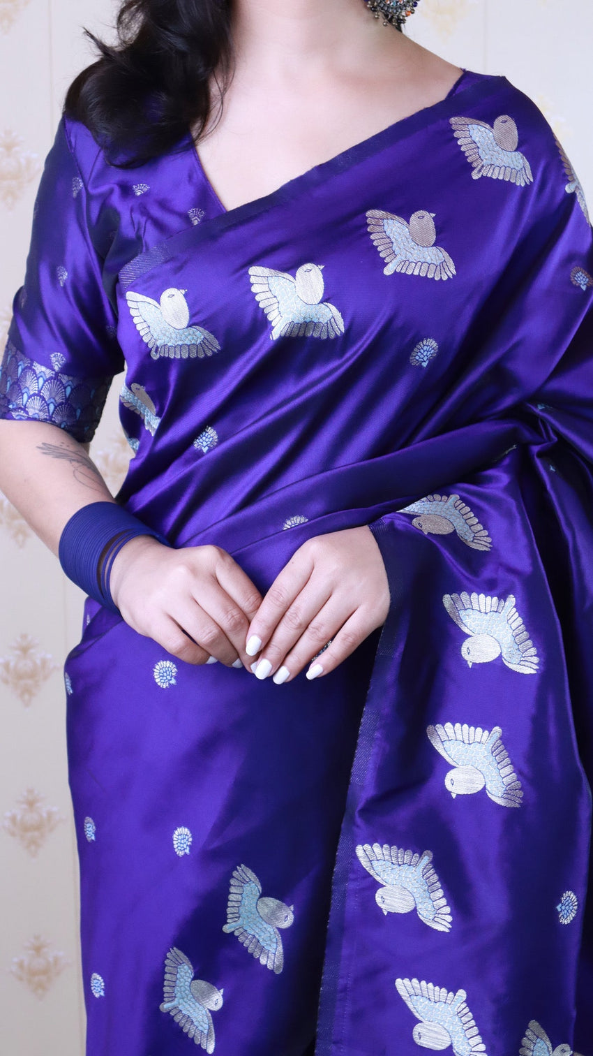 Violet soft silk dual zari woven saree with bird border