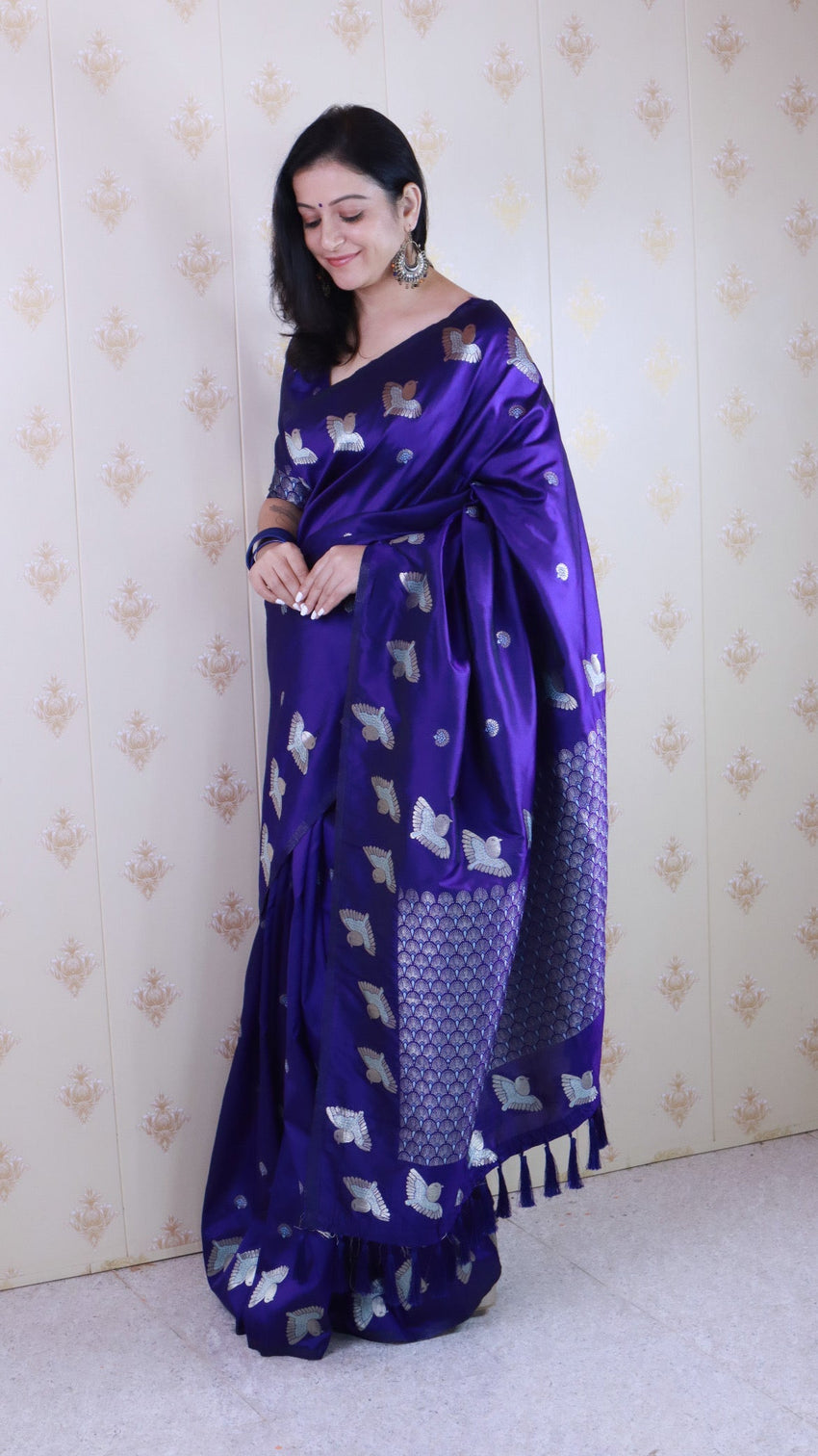 Violet soft silk dual zari woven saree with bird border