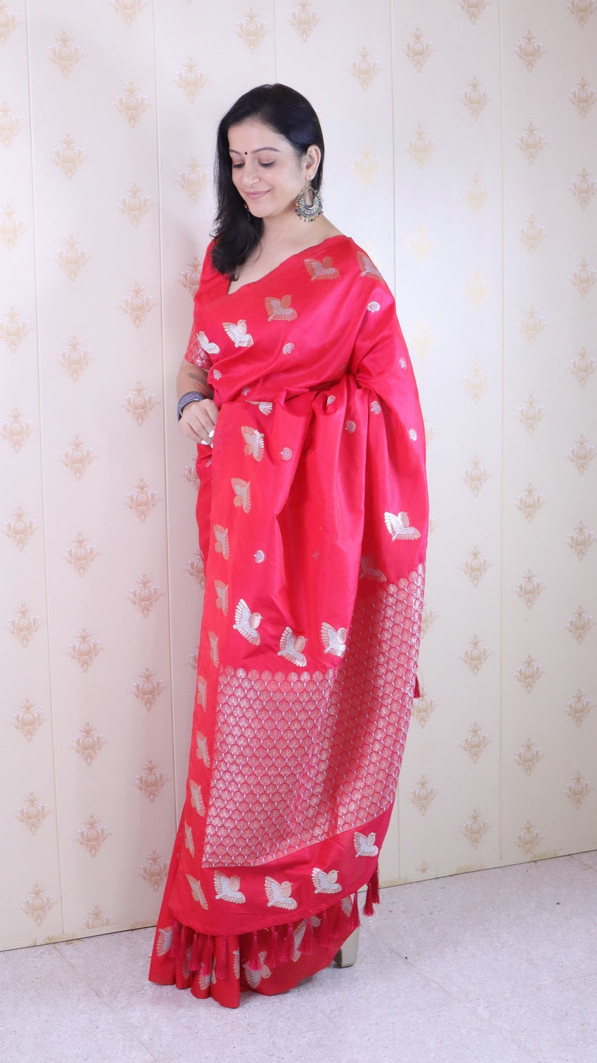 Pink soft silk dual zari woven saree with bird border