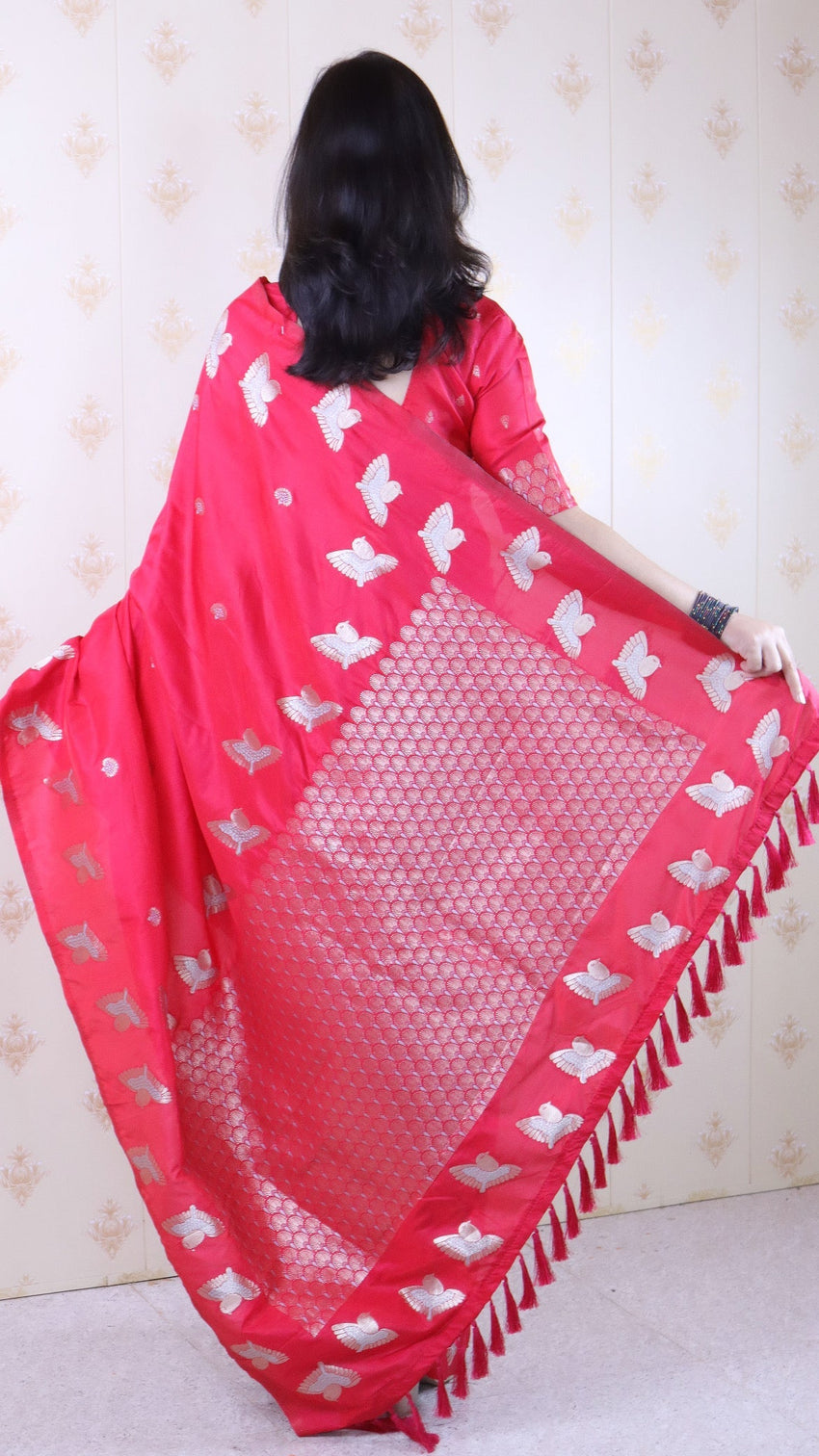 Pink soft silk dual zari woven saree with bird border