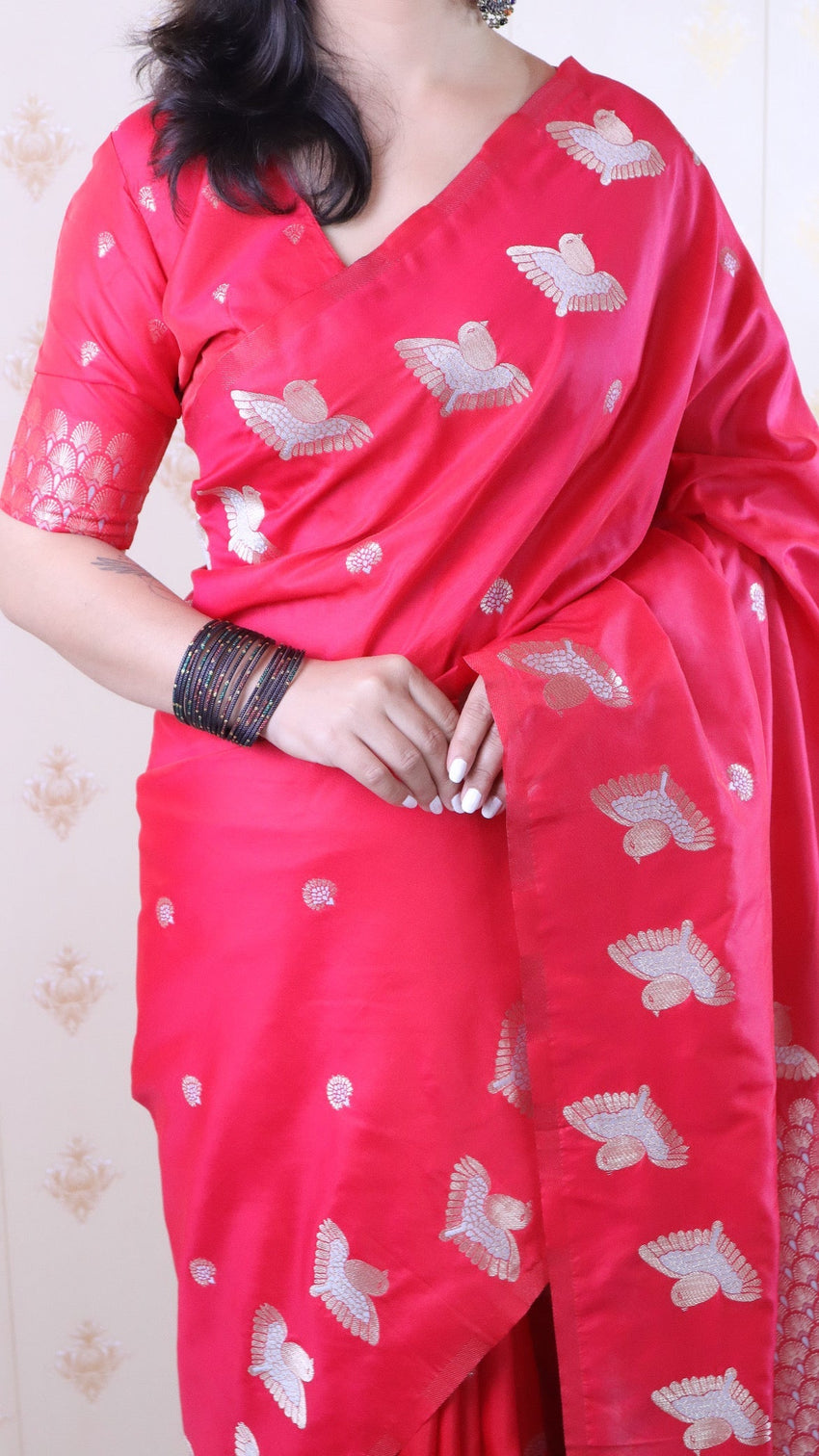 Pink soft silk dual zari woven saree with bird border