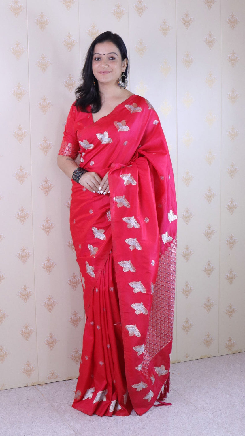 Pink soft silk dual zari woven saree with bird border