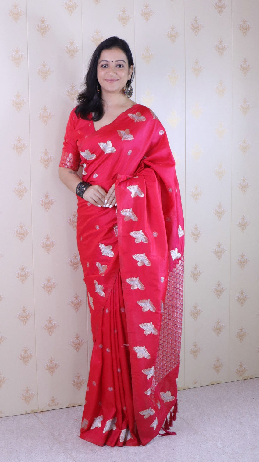 Pink soft silk dual zari woven saree with bird border