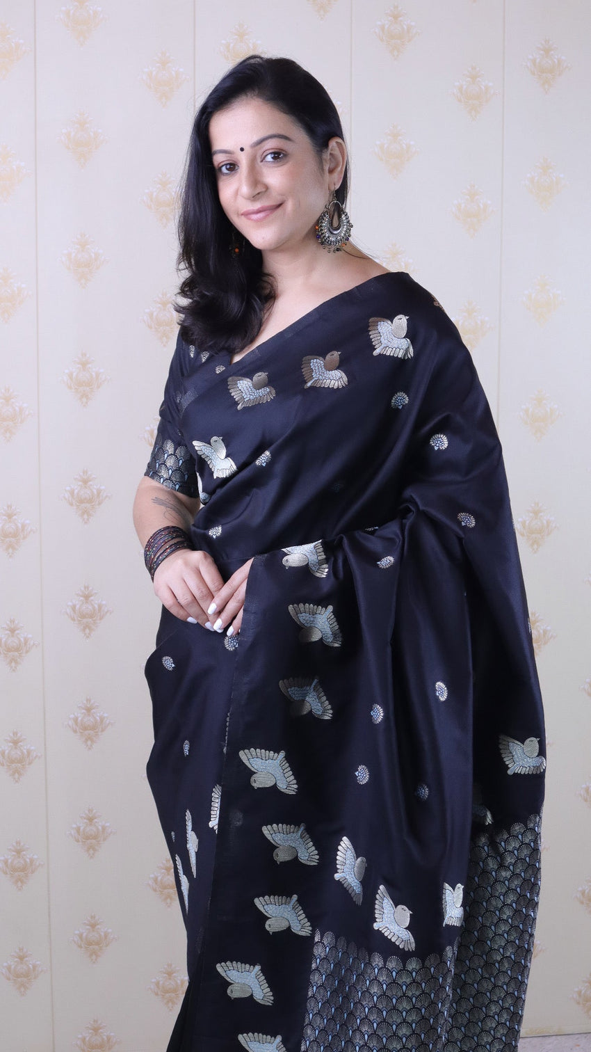 Black soft silk dual zari woven saree with bird border