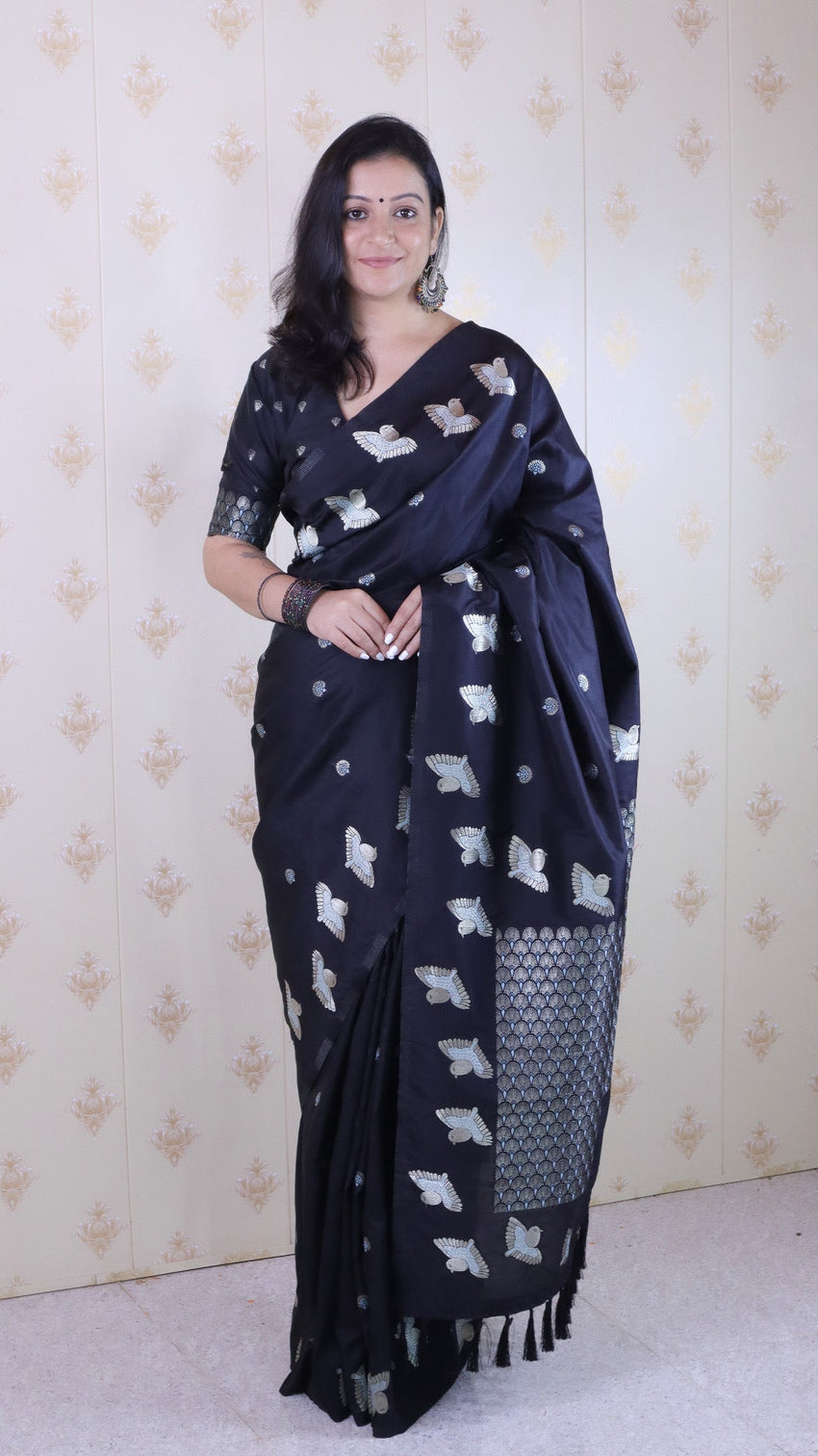 Black soft silk dual zari woven saree with bird border