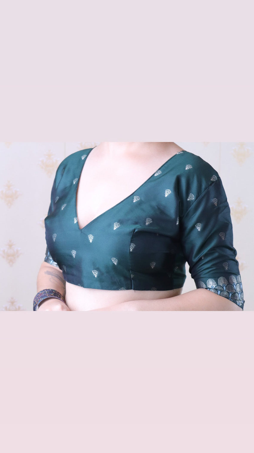 Bottle green soft silk dual zari woven saree with bird border