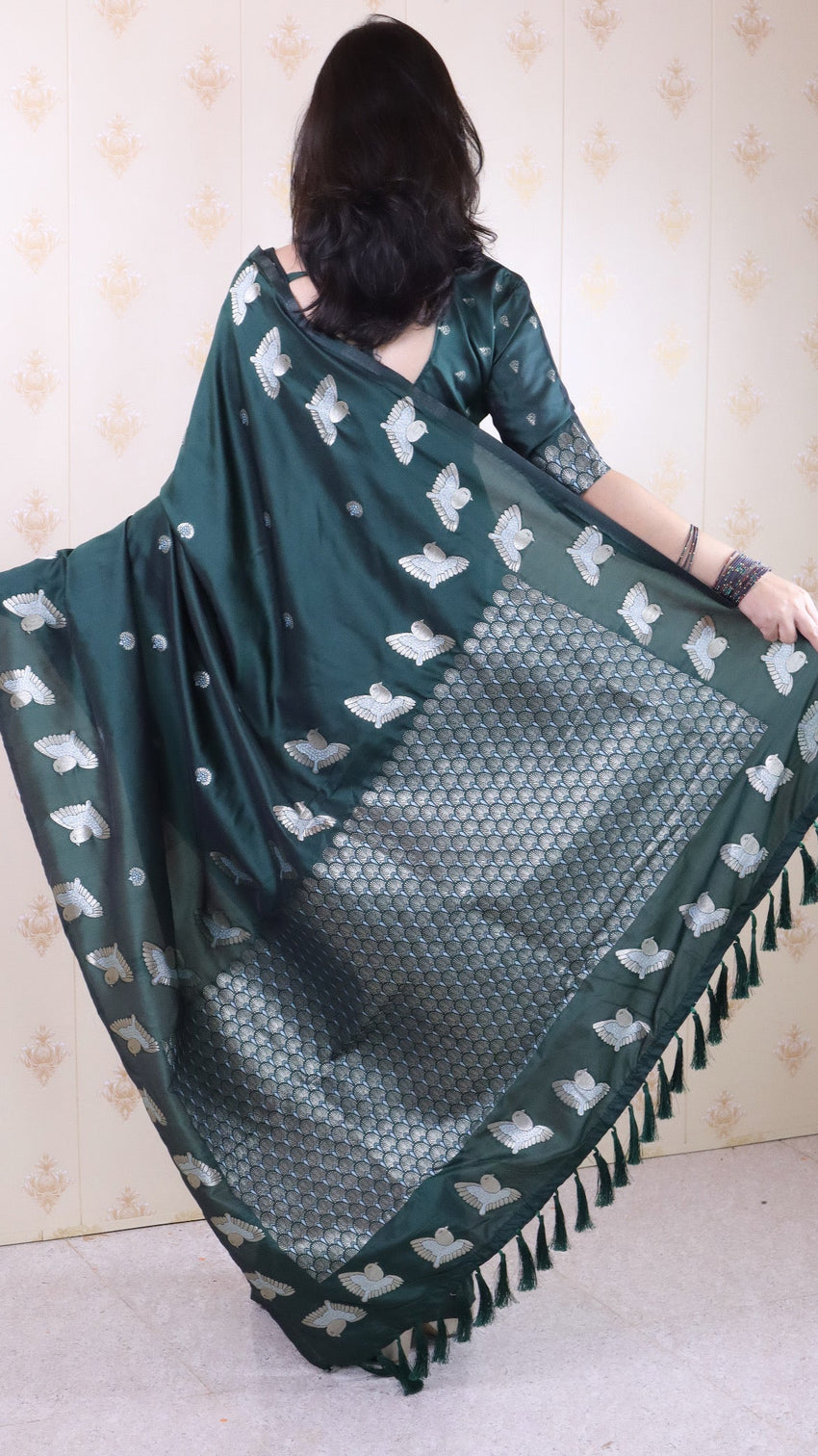 Bottle green soft silk dual zari woven saree with bird border