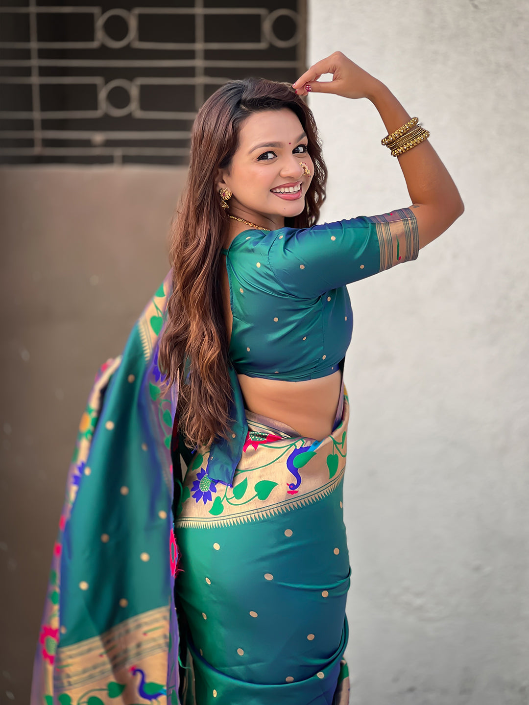 Green big border paithani silk zari woven saree