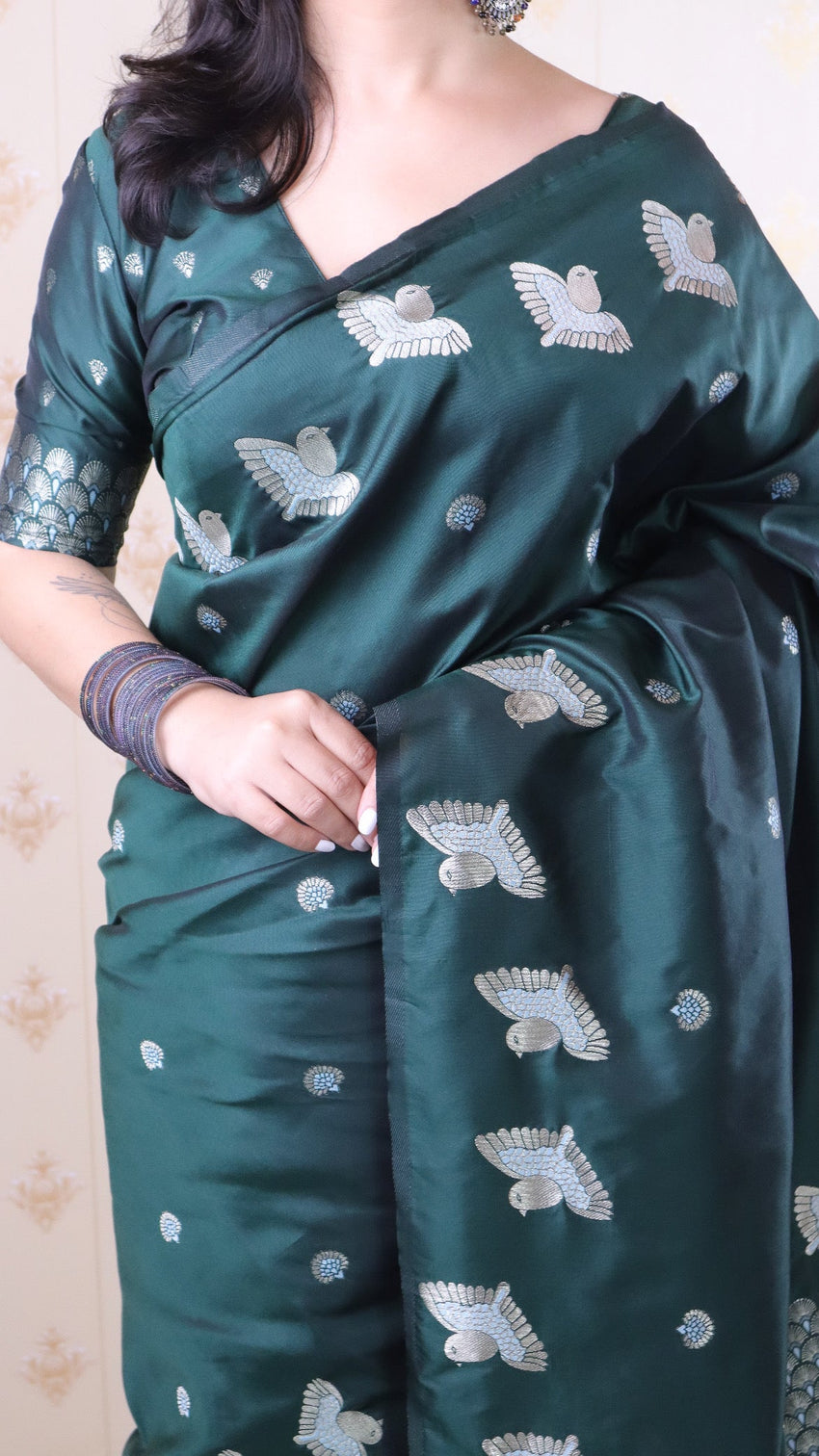 Bottle green soft silk dual zari woven saree with bird border