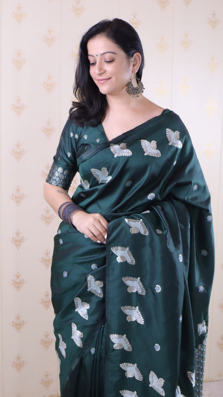 Bottle green soft silk dual zari woven saree with bird border