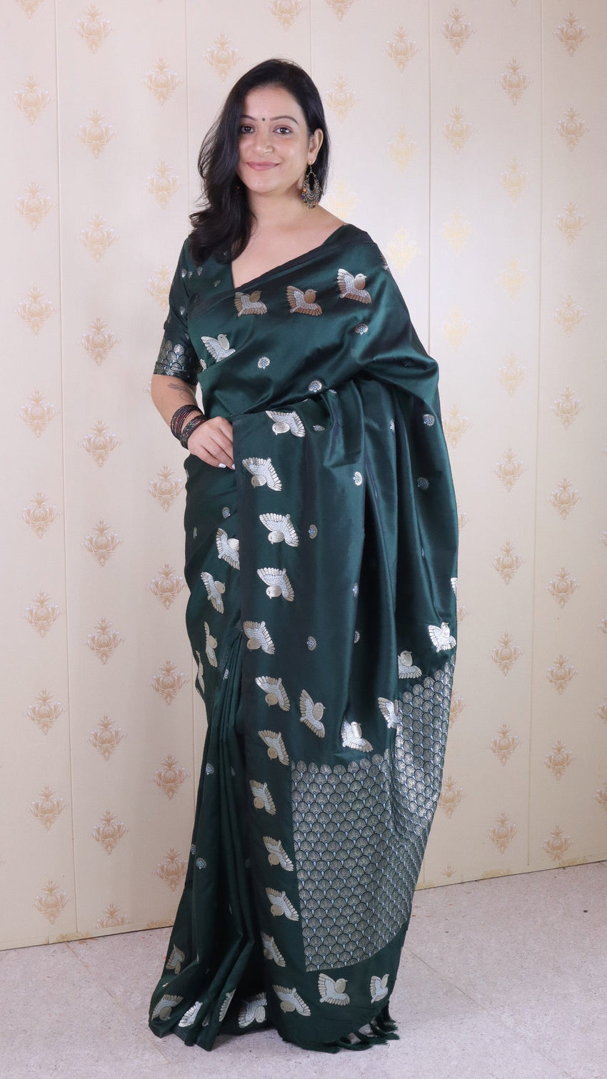 Bottle green soft silk dual zari woven saree with bird border