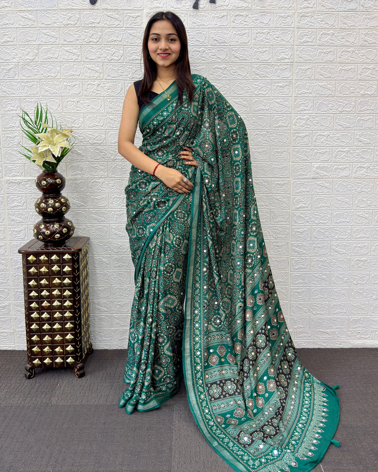 Emerald green modal silk saree with traditional ajrakh print designer pallu festive ethnic wear saree