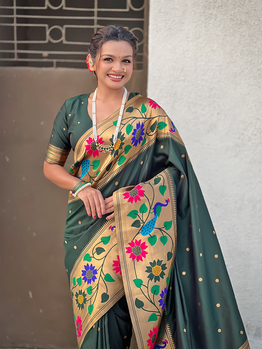 Bottle green big border paithani silk zari woven saree
