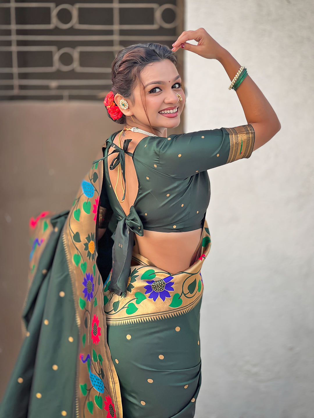 Bottle green big border paithani silk zari woven saree