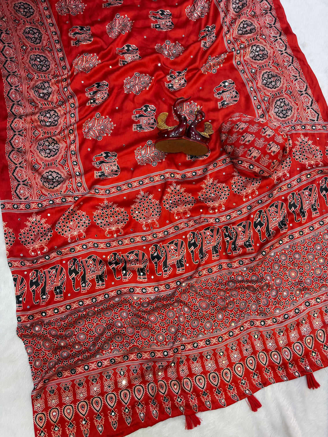Rust red modal silk saree with elephant motif ajrakh print designer pallu traditional ethnic festive wear saree