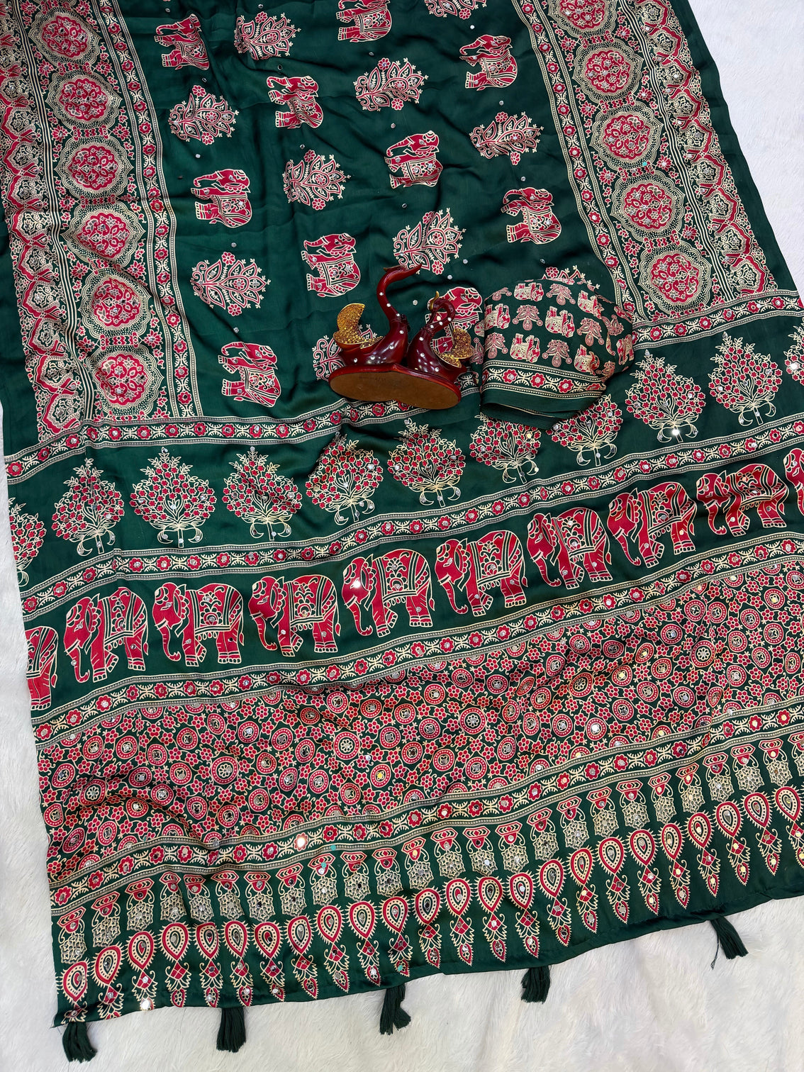 Forest green modal silk saree with elephant motif ajrakh print designer heritage pallu traditional festive wear saree