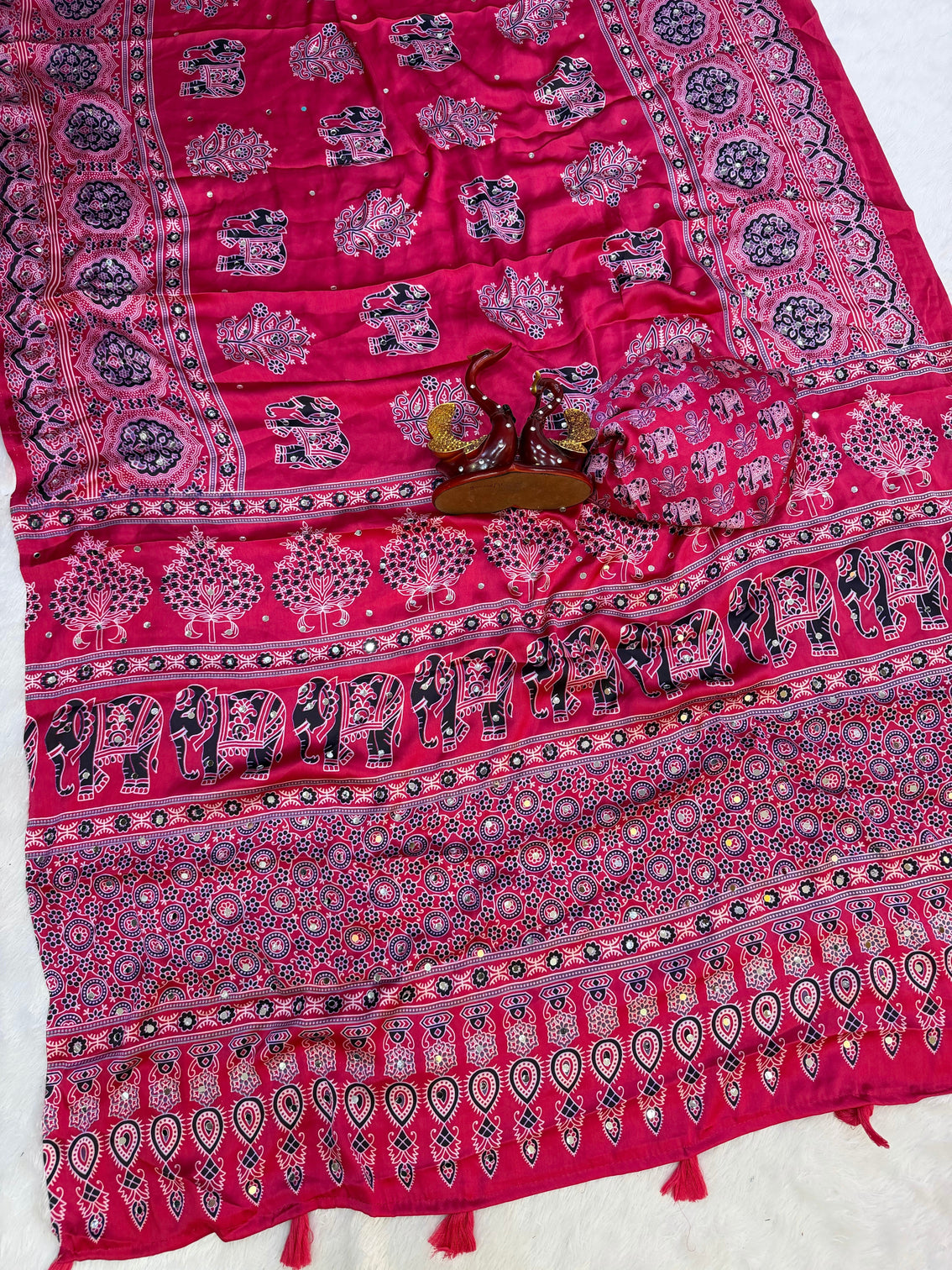 Rani pink modal silk saree with elephant motif ajrakh print designer pallu festive ethnic wear saree