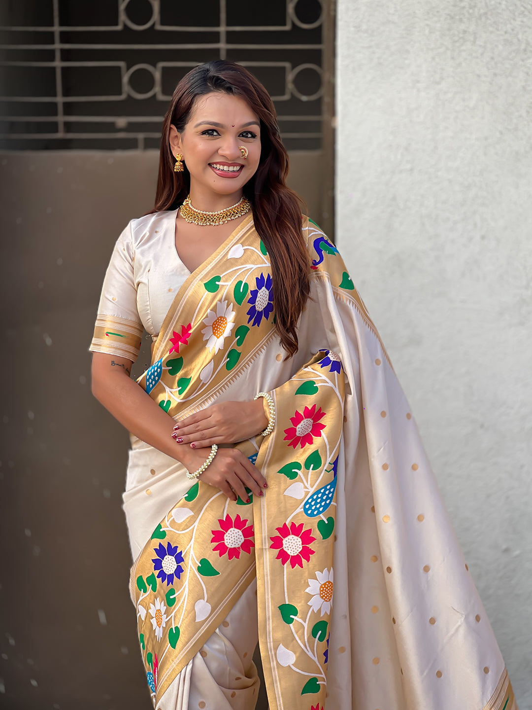 Cream big border paithani silk zari woven saree