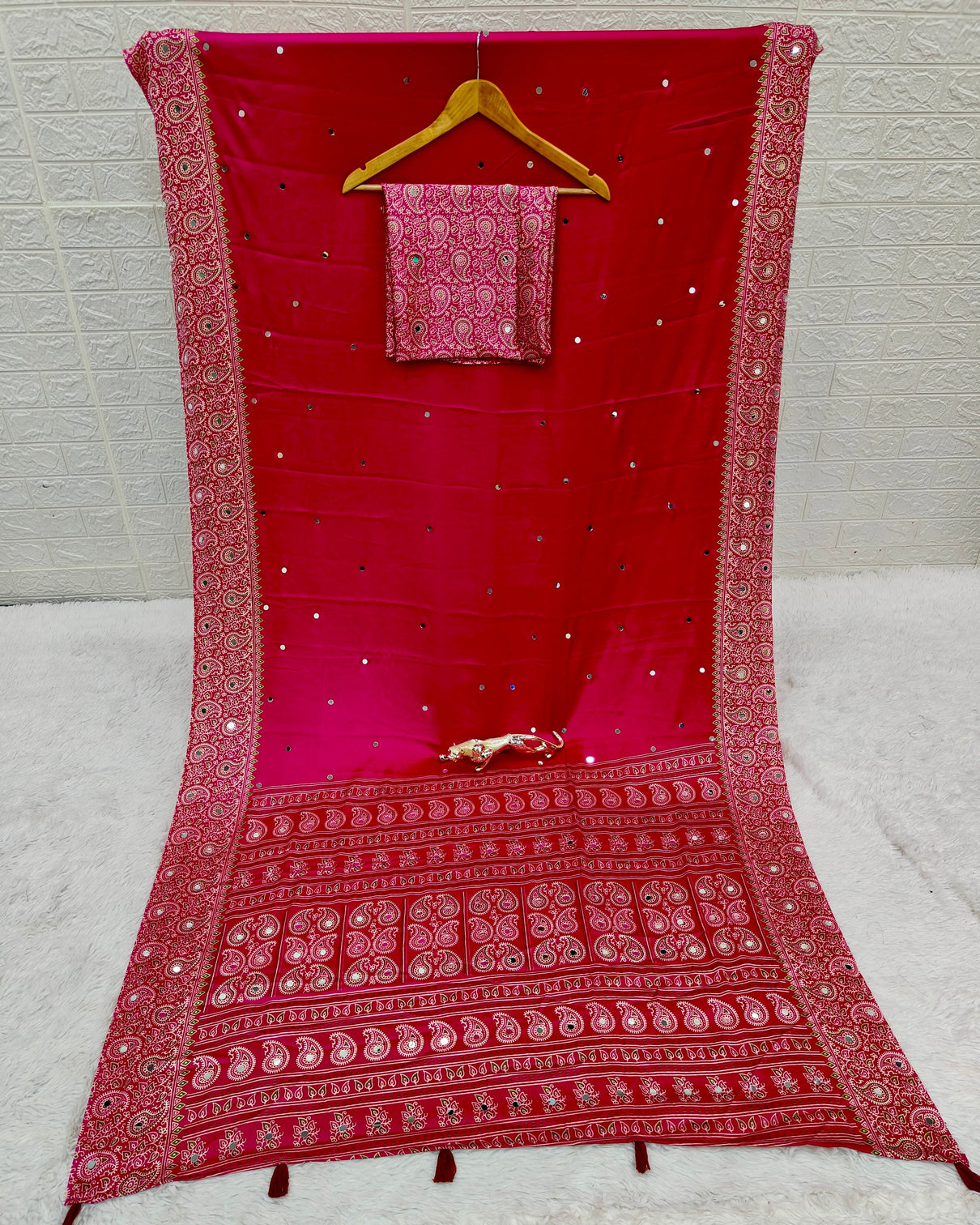 Rani pink satin silk saree with kashmiri paisley print pallu mirror butti detailing festive wedding party wear saree