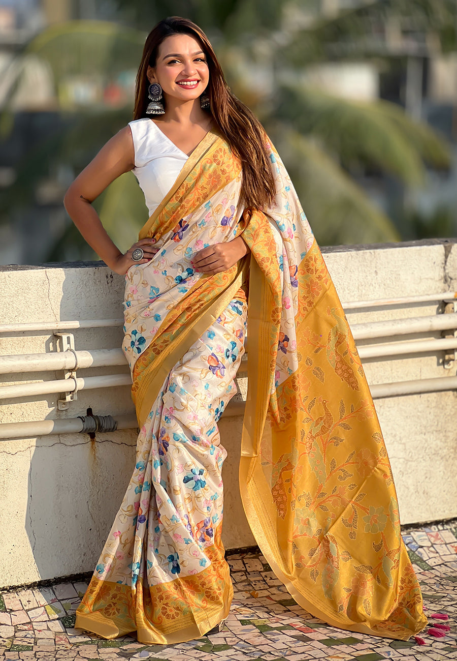 Gold tussar silk kalamkari printed saree with zari woven border