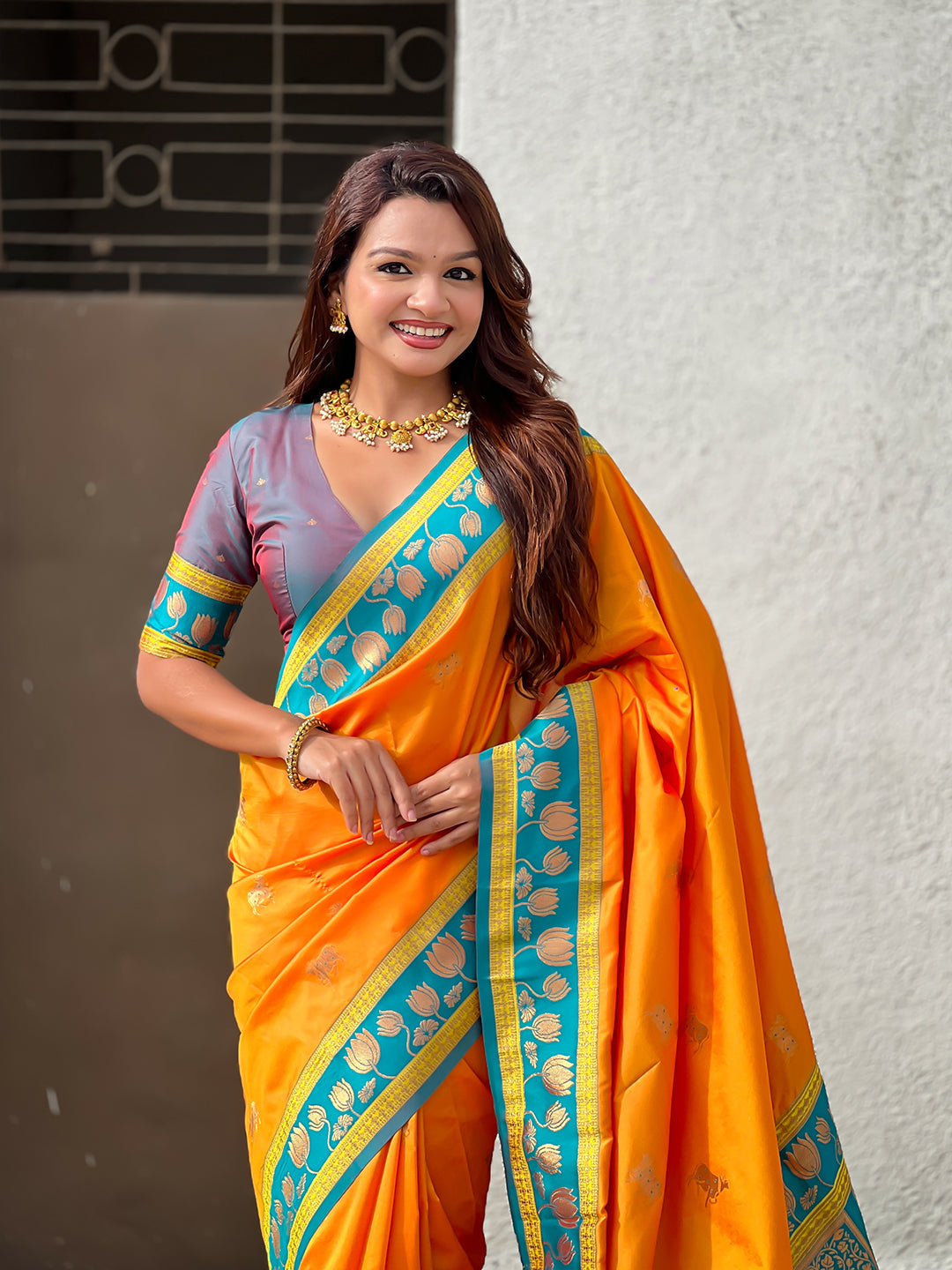 Orange soft silk pichwai traditional zari woven saree
