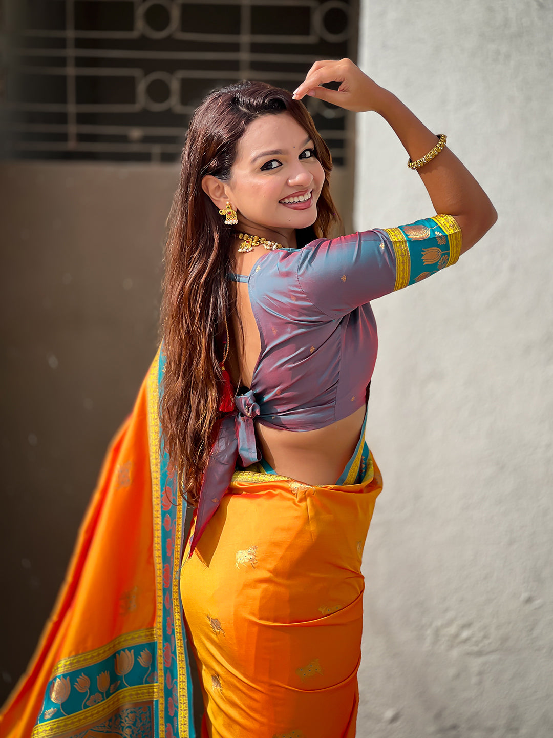 Orange soft silk pichwai traditional zari woven saree