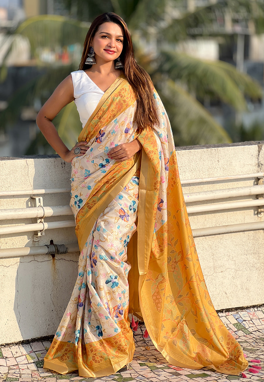Gold tussar silk kalamkari printed saree with zari woven border