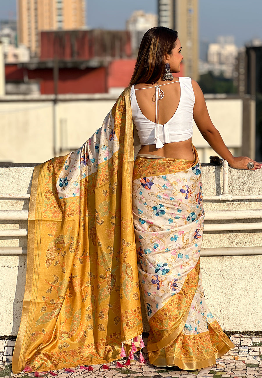 Gold tussar silk kalamkari printed saree with zari woven border