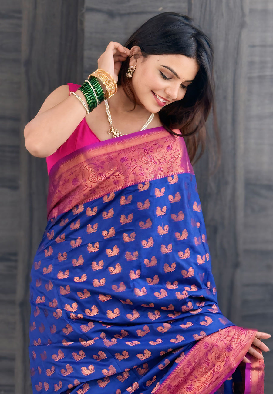 Navy blue soft silk peacock weaves zari woven saree