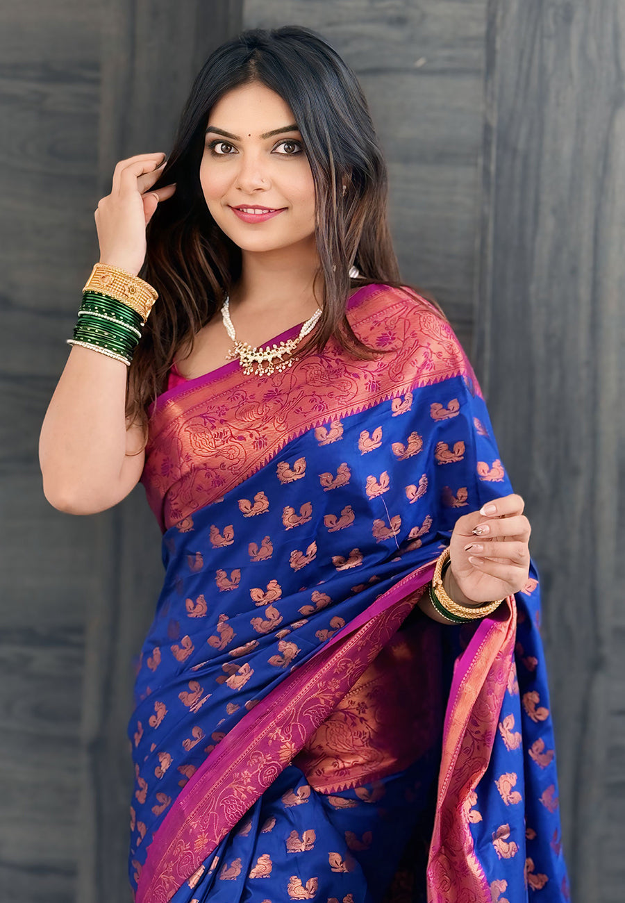 Navy blue soft silk peacock weaves zari woven saree