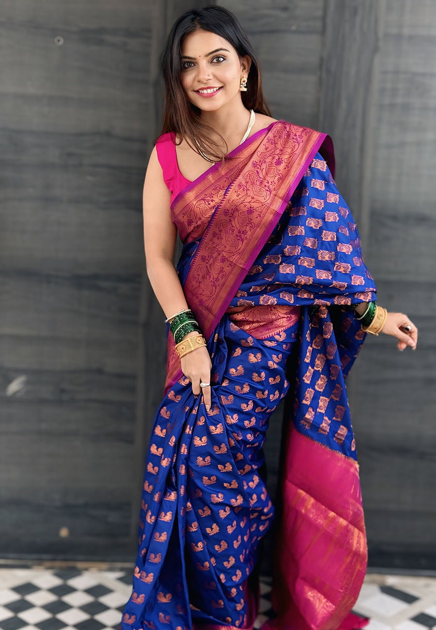 Navy blue soft silk peacock weaves zari woven saree