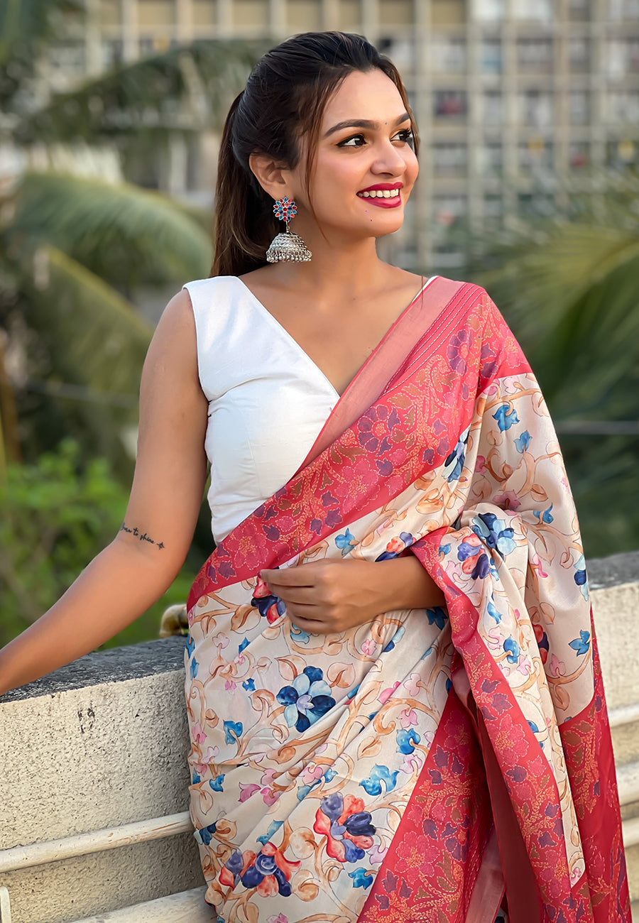 Coral red tussar silk kalamkari printed saree with zari woven border