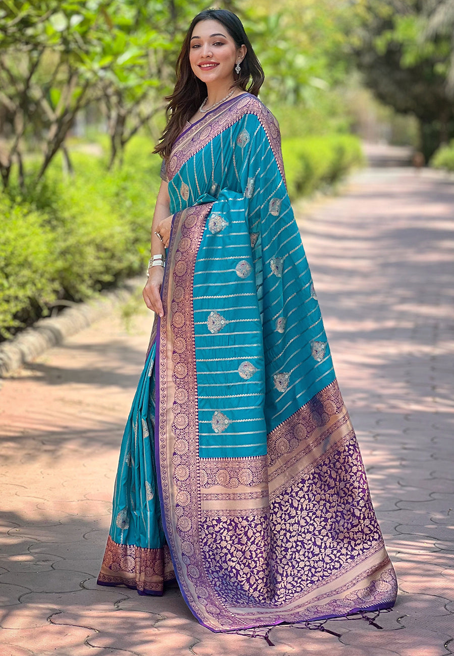 Cyan blue soft silk contrast zari woven saree