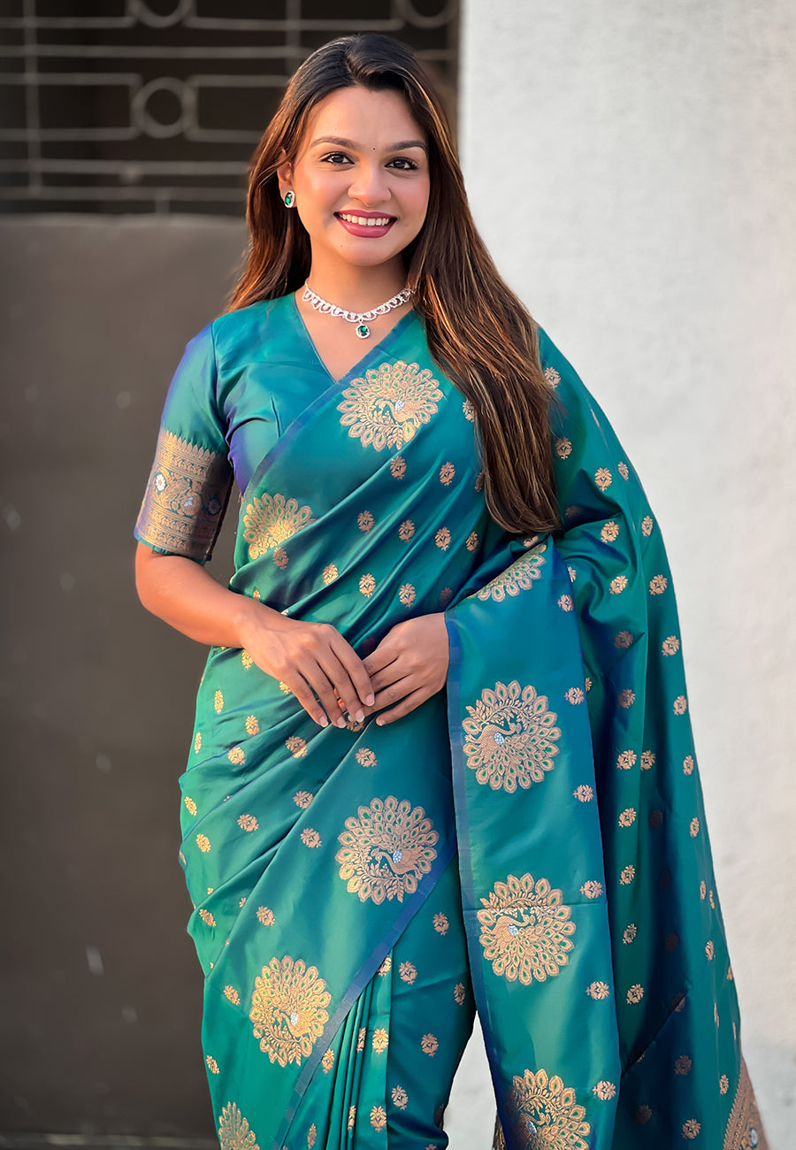 Green soft silk dual zari woven saree with peacock border